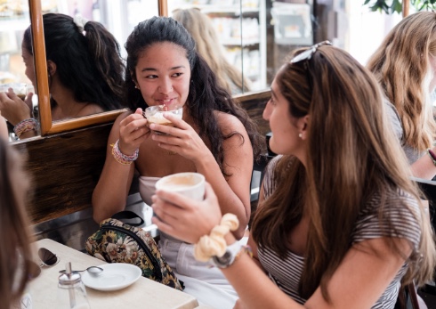 Smithsonian Student Journey Italy9 Students enjoying coffee in an Italian coffee shop